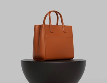 Woman's Luxury Leather Bag Mock up. 3D Rendering

