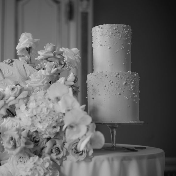 Bloom Bakehouse Cotswolds modern two tier white weding cake with pearls in minimalist style