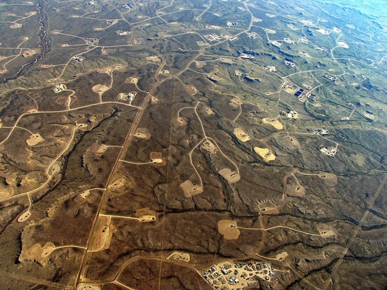Natural gas drilling pads pepper the Jonah Field and Pinedale Anticline in the southern tier of the Greater Yellowstone Ecosystem, causing severe impacts to migratory wildlife and their ancient corridors. Former Gov. Dave Freudenthal, after once inspecting the Jonah Field and lamenting the destruction of wildlife habitat, called it "an example of what not to do." Photo courtesy Ecoflight (ecoflight.org)