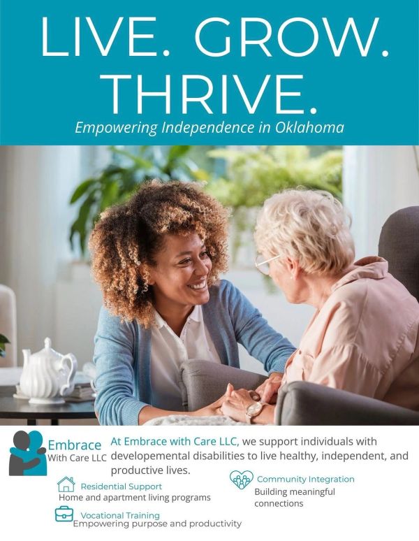 Two women smiling and holding hands, promoting independence in Oklahoma.