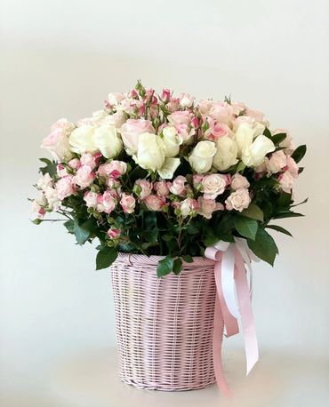 pink roses in a basket