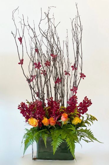 red and orange flower arrangement