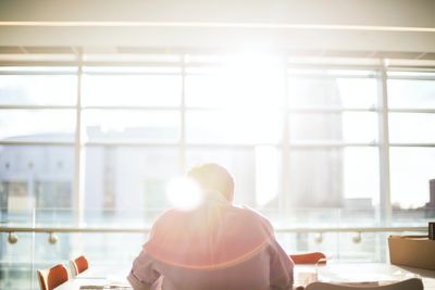 Depression, trauma, man at office. Photo credit https://unsplash.com/@bkotynski