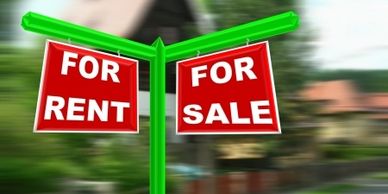 Red signs indicating properties for rent and for sale on a green post.