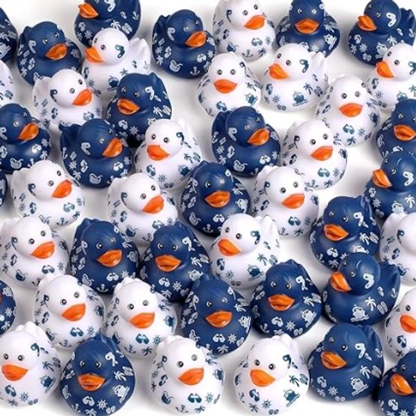 A collection of navy blue and white rubber ducks with nautical patterns.