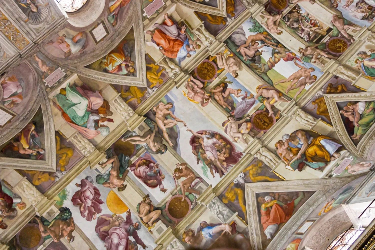 A portion of the Sistine Chapel ceiling shows the Creation of Adam - (cannot be sold)