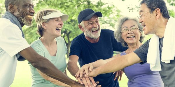 A group of seniors enjoying their golden years with the benefits of Medicare coverage.