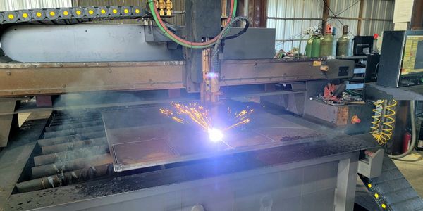 CNC plasma torch cutting 1 inch metal