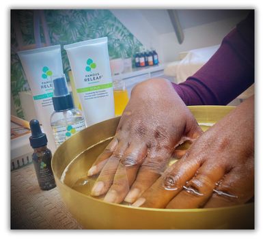 Lady having a soaked manicure at my nail salon in Milton Keynes