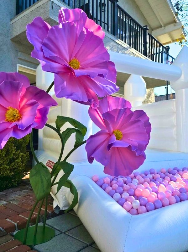 Purple poppy giant flower rental from Playday LA. Santa Clarita flower rentals for your next party.