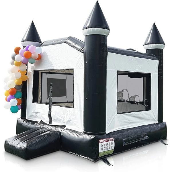 Inflatable black & white bouncy castle in sleek monochrome with basketball hoop & ball toss nets.