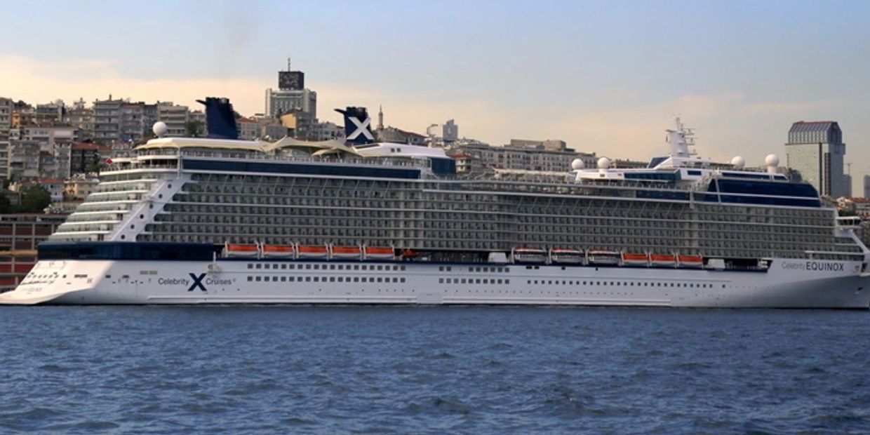 a large cruise ship in a body of water