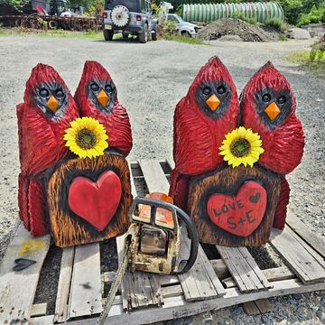 Double cardinals. Sunflowers included.  Starts at $250. Please call or message to order.  
Name pers