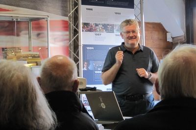 Photo of Dr Richard Marks, historian, delivering a history talk 