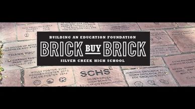 Engraved bricks promoting the Brick Buy Brick fundraiser at Silver Creek High School.