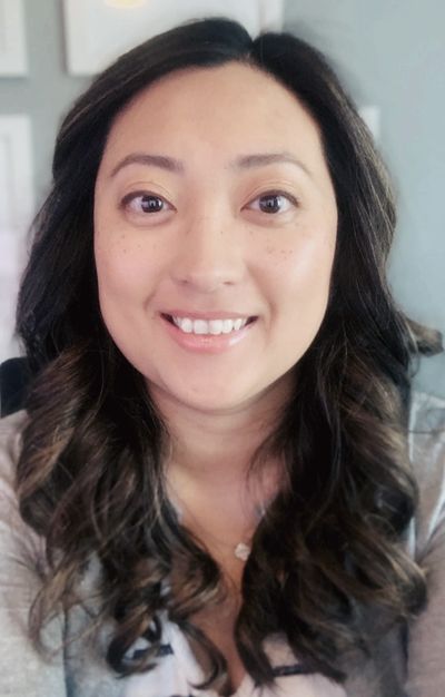Smiling, psychiatric nurse practitioner