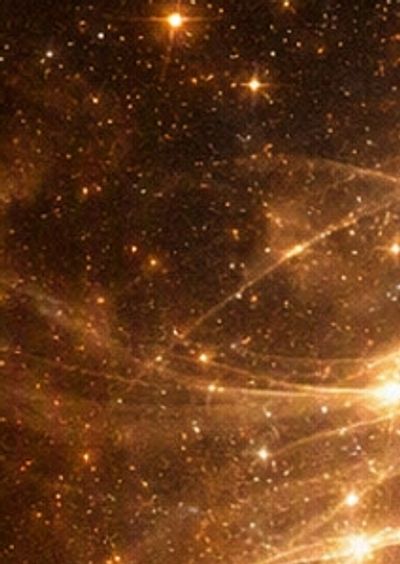 A dense star field with glowing lights and cosmic dust.