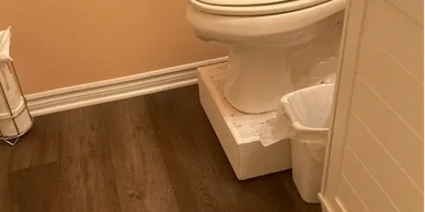 Raised platform for toilet