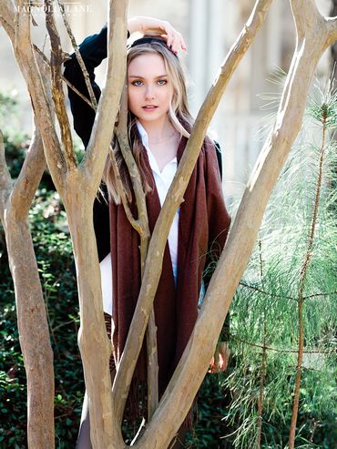 Outdoor portrait photography of a young blonde woman in the winter.
