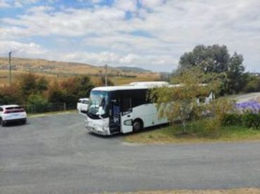 Charter Bus Parked in a Public Area