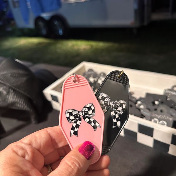 Themed checkered coquette bow.