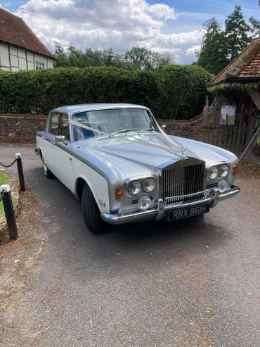 BRAY Wedding Cars. Pearl (1970 Rolls Royce Silver Shadow). Enjoying a wedding.