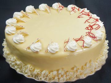 our decadent & irresistible 
white chocolate raspberry gateau