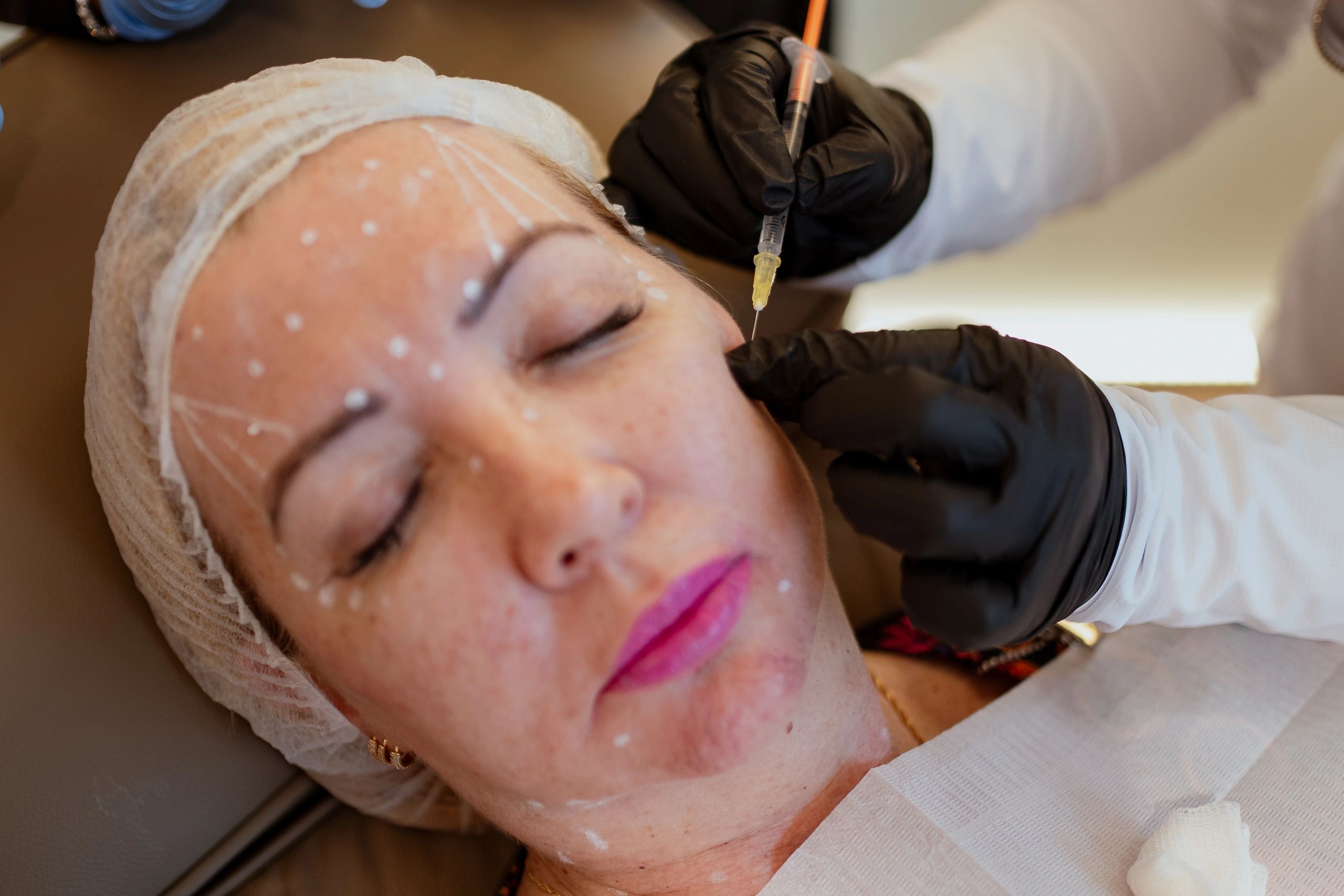 Clean, professional medical spa treatment room with neutral tones at Galex Estetica in Burlington
