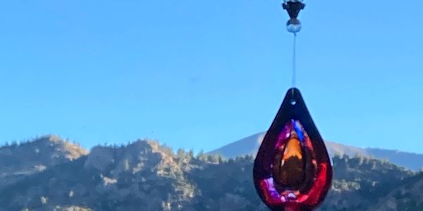 An object floating by the mountains