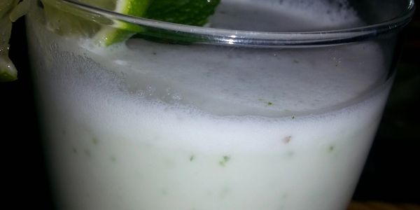 smoothie drink with lime wheel as garnish