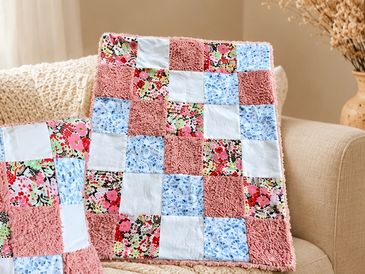Patchwork Blanket made from loved ones' clothing.