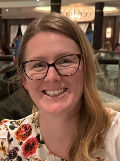 Photo of Alycia smiling.