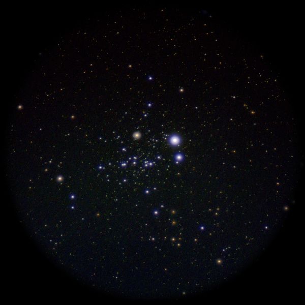 Owl Cluster - Caldwell 13 as seen through the eyepiece of a NOVA telescope