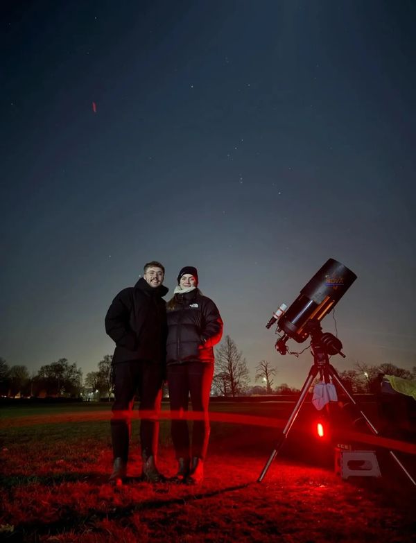 A lovely couple stood next to NOVA's mobile observatory in Derbyshire