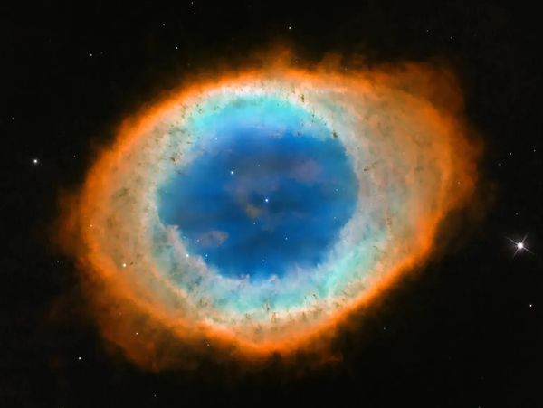 The colorful Helix Nebula glowing in space.