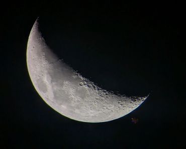 Waxing crescent moon as seen through a 4" telescope