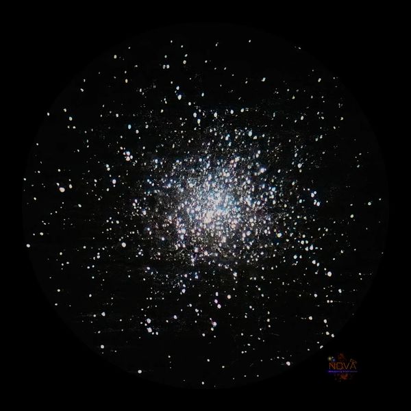 Messier 13, the great Hercules cluster through a telescope