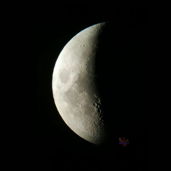 First quarter moon as seen in a telescope