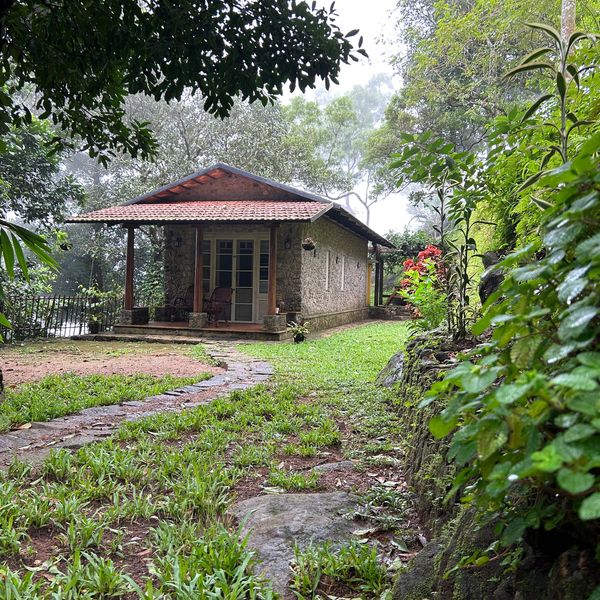 Elegant exteriors of the Planters Cottage, a 60-year-old estate labor shed turned luxury eco-retreat