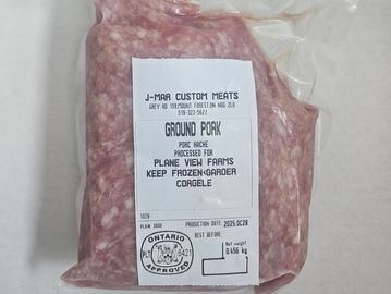 Vacuum-sealed package of ground pork from J-Mar Custom Meats.