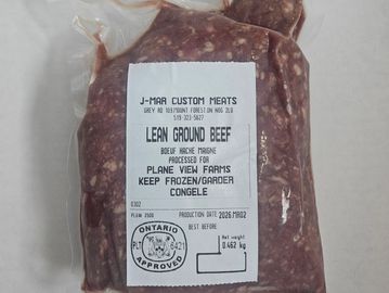 Vacuum-sealed package of lean ground beef from J-Mar Custom Meats, Ontario approved.