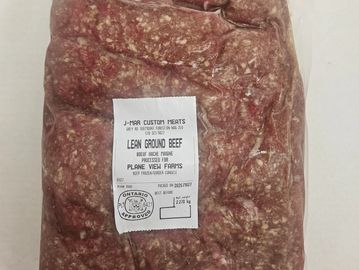 Vacuum-sealed package of lean ground beef from J-Mar Custom Meats.