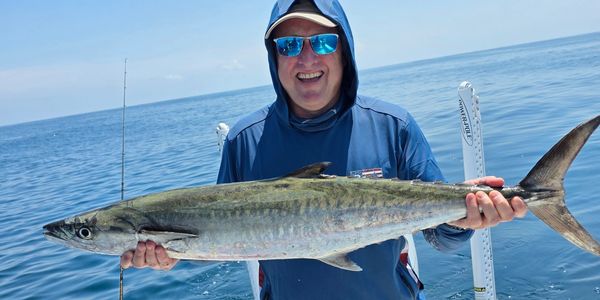 Summer is very good Offshore Fishing here in Daytona Beach client with one of many kingfish caught 