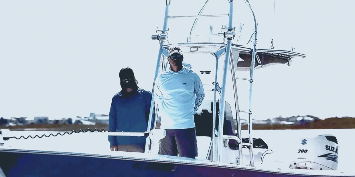 Captain Brad front center over 25yrs taking clients fishing  since 2000