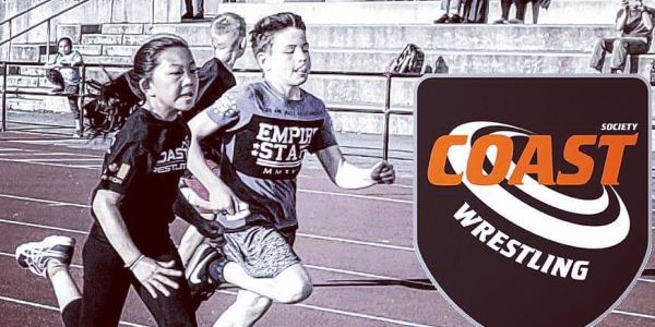 Two young athletes sprinting on a track with a Coast Wrestling logo.
