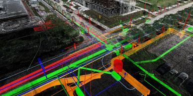 Digital 3D model of underground utilities beneath a street intersection.