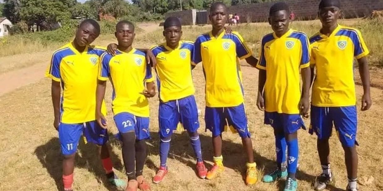 group of kids on soccer gear