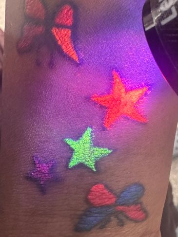 Glow in the dark neon tattoo