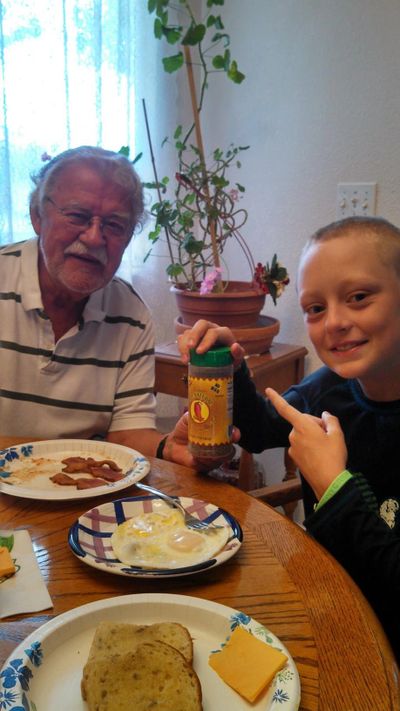 dave and sean At breakfast table dave's smoked jalapeno salt on eggs.