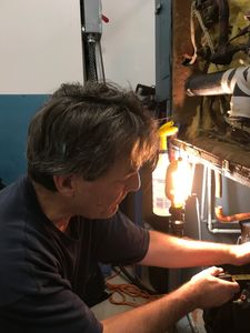 Mike Minor measuring piping for compressor installation